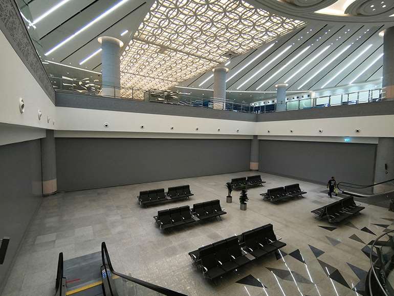 McKeon fire and smoke protection shutters closed across a wide airport concourse opening